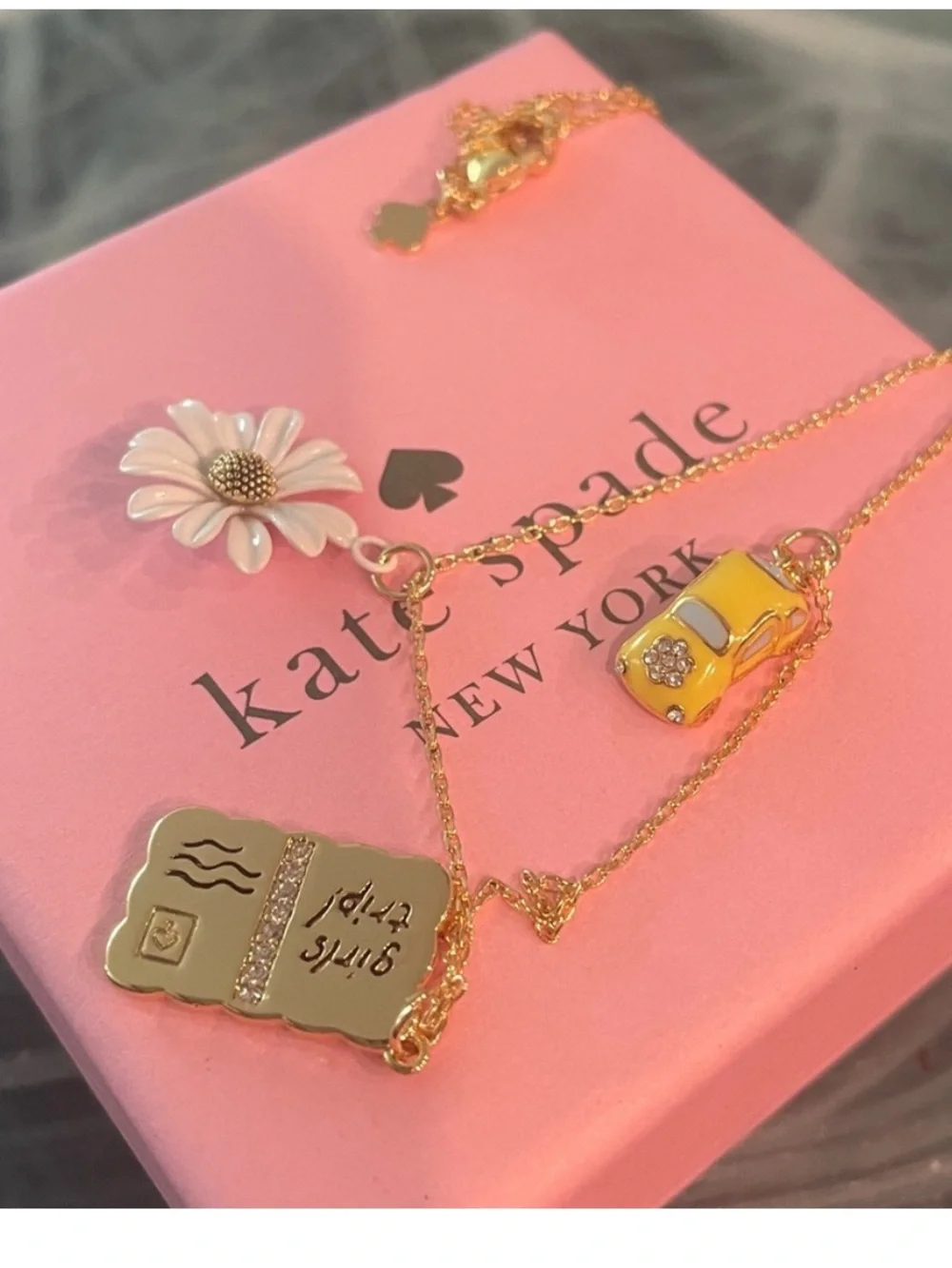 kate spade Gold Necklace with Yellow Taxi, White Daisy & Gold Book Charms